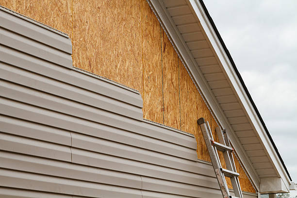 Professional Siding Repair technician working in Chester, PA